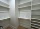 Large walk-in closet with ample shelving and hanging space at 314 Hinton St, Apex, NC 27502