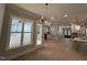 Bright dining room with hardwood floors and chandelier at 314 Hinton St, Apex, NC 27502