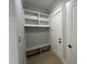 Bright entryway with built-in bench, shelving, and herringbone-patterned wall at 314 Hinton St, Apex, NC 27502