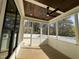 Relaxing screened porch with wood ceiling and access to backyard at 314 Hinton St, Apex, NC 27502