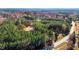 Expansive aerial view of wooded acreage with a potential building site and road access, perfect for a private retreat at 3214 Tump Wilkins Rd, Stem, NC 27581