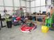 Large garage with go karts, workbenches, and lots of space at 3214 Tump Wilkins Rd, Stem, NC 27581