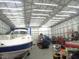 Interior of the outbuilding, a brightly lit space perfect for a boat and other equipment at 3214 Tump Wilkins Rd, Stem, NC 27581