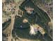 A property map showing land boundaries and the locations of buildings and roads at 3214 Tump Wilkins Rd, Stem, NC 27581