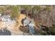 Aerial view of a gray house on a wooded lot at 35 Arbor Dr, Youngsville, NC 27596