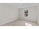 Bright bedroom with carpeted flooring and a window at 35 Arbor Dr, Youngsville, NC 27596
