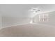 Spacious bedroom with carpeted floor and ceiling fan at 35 Arbor Dr, Youngsville, NC 27596