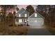 Two-story house with gray siding, a two-car garage, and a front porch at 35 Arbor Dr, Youngsville, NC 27596