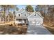 Two-story house with gray siding, a two-car garage, and a front porch at 35 Arbor Dr, Youngsville, NC 27596