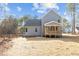 Gray house with wooden deck and large backyard at 35 Arbor Dr, Youngsville, NC 27596