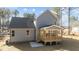 Gray house with wooden deck and backyard at 35 Arbor Dr, Youngsville, NC 27596