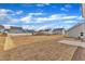 Large backyard view showing a concrete patio surrounded by newly laid sod at 517 Southwick Pl, Mebane, NC 27302