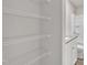 Walk-in closet featuring modern wire shelving and easy access to the bathroom at 517 Southwick Pl, Mebane, NC 27302