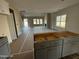 View of kitchen and living room, showcasing an open floor plan at 6967 Jefferson Davis Hwy, Cameron, NC 28326