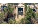 Aerial view of house nestled among tall trees at 75 Arbor Dr, Youngsville, NC 27596
