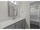 Clean bathroom with vanity, mirror, and tub/shower combo at 75 Arbor Dr, Youngsville, NC 27596