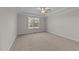 Bright bedroom with carpeted floors and ceiling fan at 75 Arbor Dr, Youngsville, NC 27596