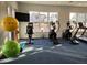 Fitness center featuring ellipticals, exercise balls, and a recumbent bike at 110 Sawtooth Oak Ln, Youngsville, NC 27596