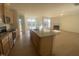 Open concept kitchen with large island and stainless steel appliances at 110 Sawtooth Oak Ln, Youngsville, NC 27596