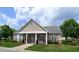 Community clubhouse with landscaping and columns at 11331 Involute Pl # 100, Raleigh, NC 27617