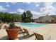Refreshing community pool with surrounding landscaping at 11331 Involute Pl # 100, Raleigh, NC 27617