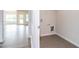 Laundry room with tile flooring and shelving at 196 Vili Dr, Broadway, NC 27505