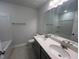 Double vanity bathroom with a bathtub and tile flooring at 30 Calabria Ct, Franklinton, NC 27525