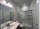 Bathroom with single vanity and walk-in shower at 30 Calabria Ct, Franklinton, NC 27525
