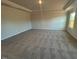 Spacious bonus room with neutral carpeting and ample natural light at 30 Calabria Ct, Franklinton, NC 27525