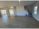 Spacious living room with hardwood floors and staircase at 30 Calabria Ct, Franklinton, NC 27525