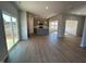 Open concept living area with hardwood floors and kitchen views at 30 Calabria Ct, Franklinton, NC 27525