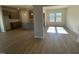 Spacious living room with hardwood floors and access to the kitchen at 30 Calabria Ct, Franklinton, NC 27525
