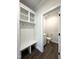 Mudroom features coat hooks, bench and cubbies, and opens into a half-bath at 7575 Sweetwater Dr, Nashville, NC 27856