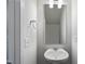 Clean bathroom with a single sink and large mirror at 8816 Melvin St # 15, Willow Springs, NC 27592