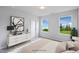 Bedroom with two windows and dresser at 8816 Melvin St # 15, Willow Springs, NC 27592