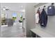 Bright entryway with bench and coat hooks, open to living area at 8816 Melvin St # 15, Willow Springs, NC 27592