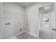 Bright laundry room with access to bedroom at 8816 Melvin St # 15, Willow Springs, NC 27592