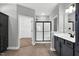 Bathroom boasts tile flooring, a glass-enclosed shower, and walk-in closet at 91 Laramie Ln, Selma, NC 27576
