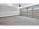 Spacious garage with concrete floor, bright lighting and plenty of room for parking and storage at 91 Laramie Ln, Selma, NC 27576