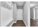 A mudroom with hooks and cubbies next to the door provides functional storage and a convenient entry area at 91 Laramie Ln, Selma, NC 27576