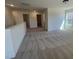 Versatile loft area with neutral carpet, abundant natural light, and flexible space for various uses at 113 Arundel Dr, Archer Lodge, NC 27527