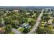 Aerial view of a landscaped home and lush mature trees at 1146 Rogers Rd, Graham, NC 27253