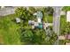 Aerial view of a home with a long driveway and lush landscaping at 1146 Rogers Rd, Graham, NC 27253