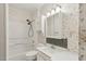 Bathroom with shower/bath combo and floral wallpaper at 1146 Rogers Rd, Graham, NC 27253