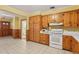 Well-appointed kitchen featuring wooden cabinets and modern appliances at 1146 Rogers Rd, Graham, NC 27253