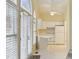 Bright eat-in kitchen featuring white cabinets and ample counter space at 1146 Rogers Rd, Graham, NC 27253