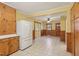 Open kitchen layout with tile floors and plenty of storage space at 1146 Rogers Rd, Graham, NC 27253