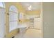 Efficient eat-in kitchen with sleek white cabinets and modern appliances at 1146 Rogers Rd, Graham, NC 27253