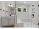 Spa-like bathroom with walk-in shower and dual sink vanity at 115 Arundel Dr, Archer Lodge, NC 27527