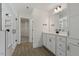 Modern bathroom with a large white vanity and tiled walk-in shower at 115 Arundel Dr, Archer Lodge, NC 27527